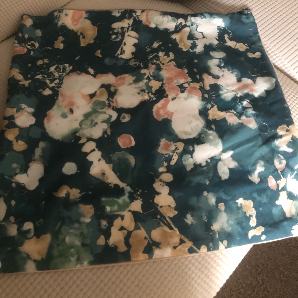 Teal and blush pillow cover from HomeGoods